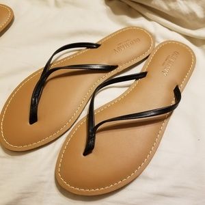 Old navy flip flops, tan base with black straps, 8